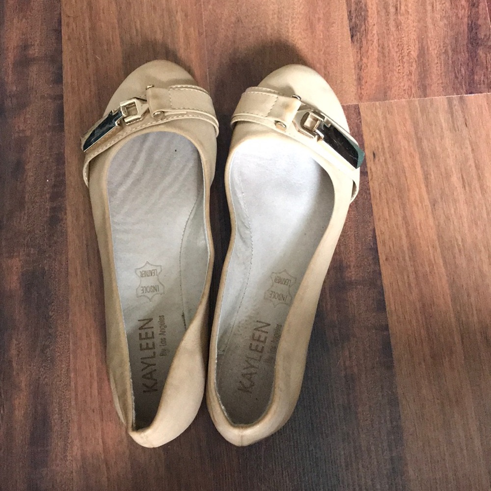 Tan buckled flats